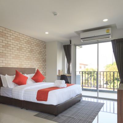 Deluxe Corner Room Q Space Residence Promo Code