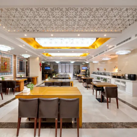 Wanda Spring Business Hotel (Daqing Sa'ertu Wanda Plaza) Отели в г. Дацин