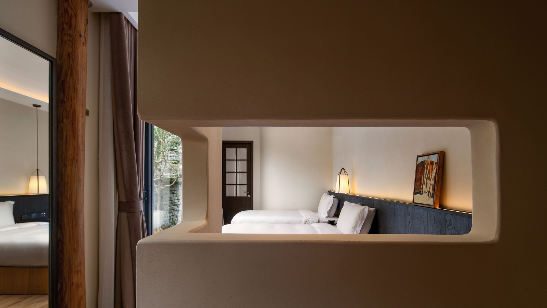 Elegant Courtyard View Twin Beds Room