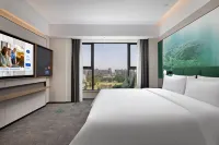 Xinyang Hampton by Hilton Hotel
