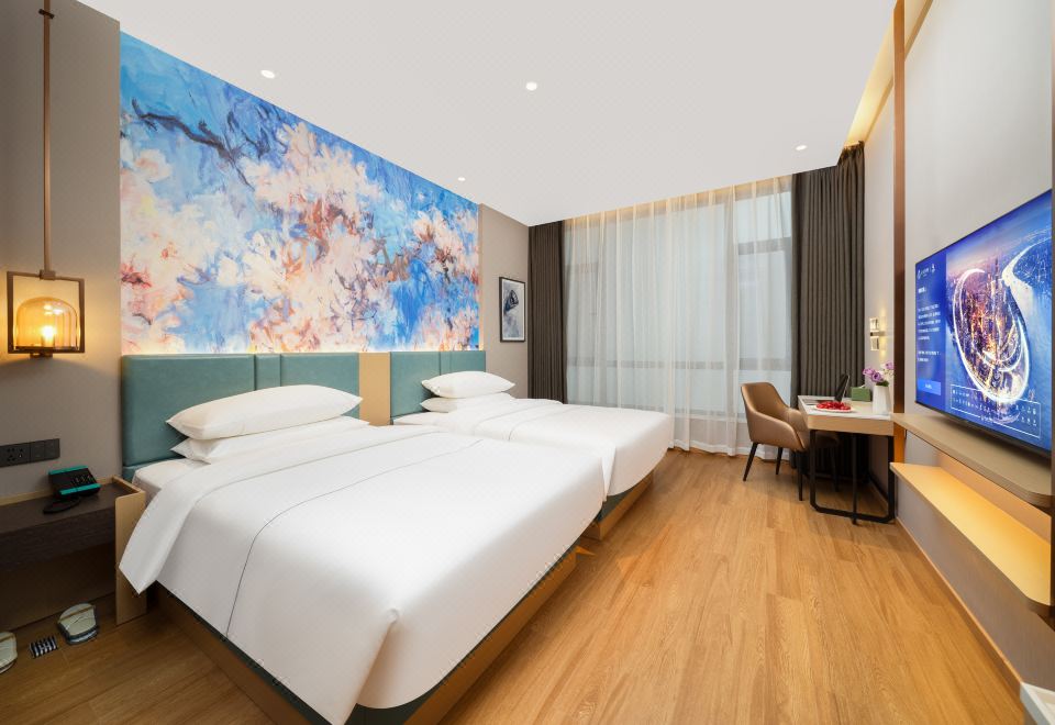 Magnotel Hotel (Jinzhong Lingshi Xinjian Street)Zero Pressure Elegant Twin Room