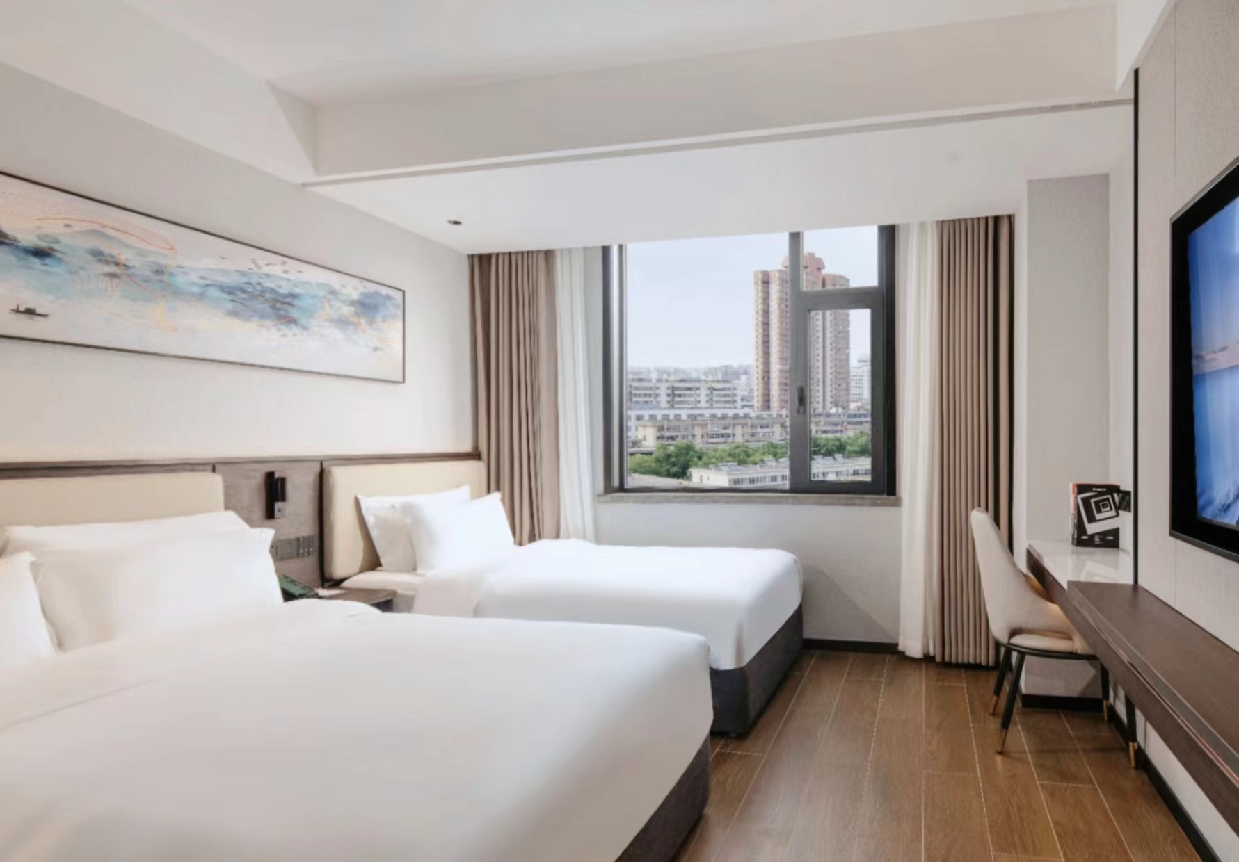 Xingbo Hotel (Xi 'an Bell Tower station Yongningmen Branch)泊享观影双床房