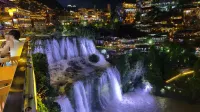 Furong Town Flower Waterfall Bay Homestay Отели в г. 