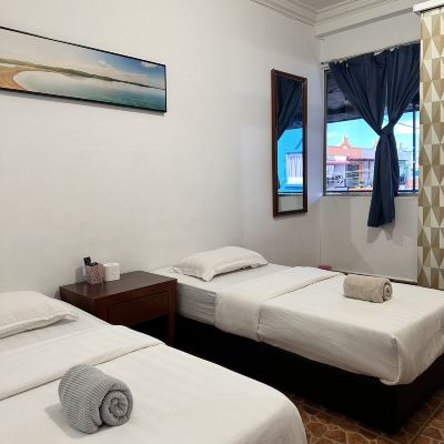 Deluxe Twin Room Kupon Warisan Family Inn