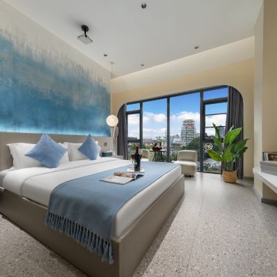 汐陽·智能投影大床房【TOTO衞浴+智能家居+Mini冰箱】 西雙版納汐嶼酒店（告莊星光夜市店）優惠