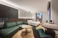 Yuexiang Huanpeng Hotel (Jingkai Wanda Plaza High-speed Railway Station) Hoteles en 