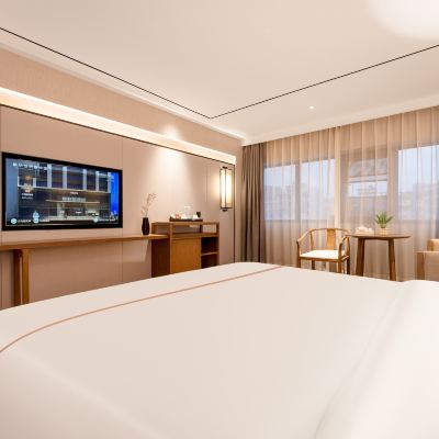 高級大床房〔零圧床墊·茶韻空間·智能燈光調節〕 華軒裡飯店（珠海唐家大學城店）優惠