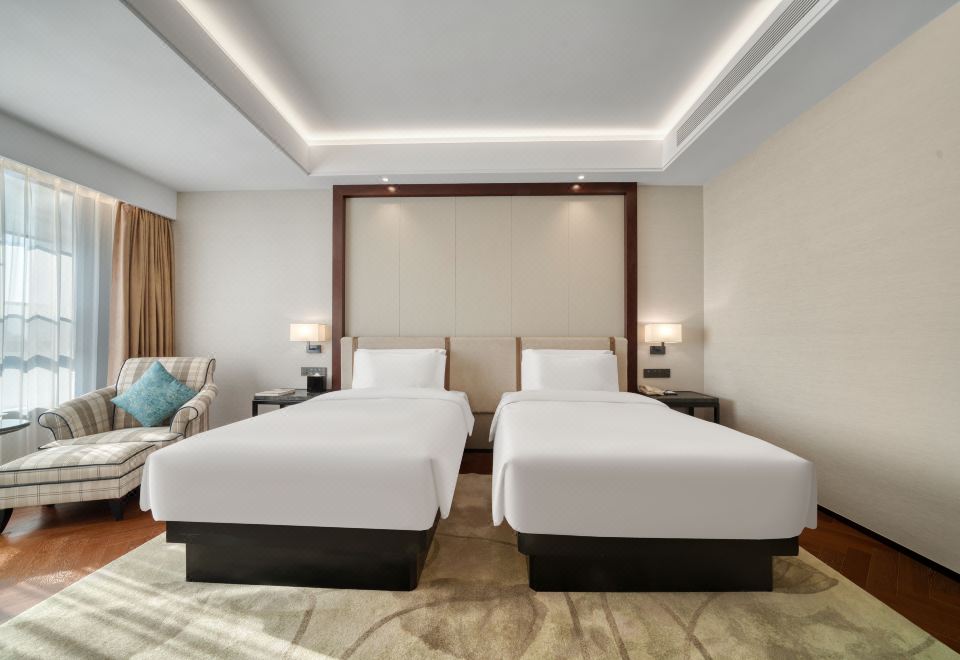 ZhouShan CaiFu HotelRenewed Twin Room (Sleep-Inducing Latex Pillow + Screen Casting + Mini Fridge)