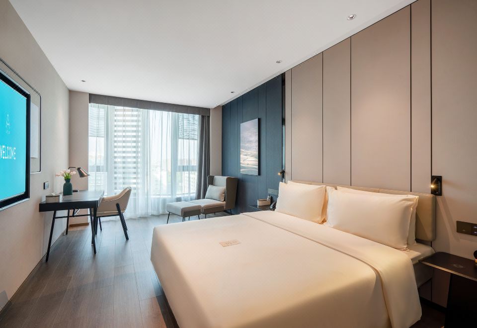 行政大床房（裸棉床品+投屏电视+小冰箱）