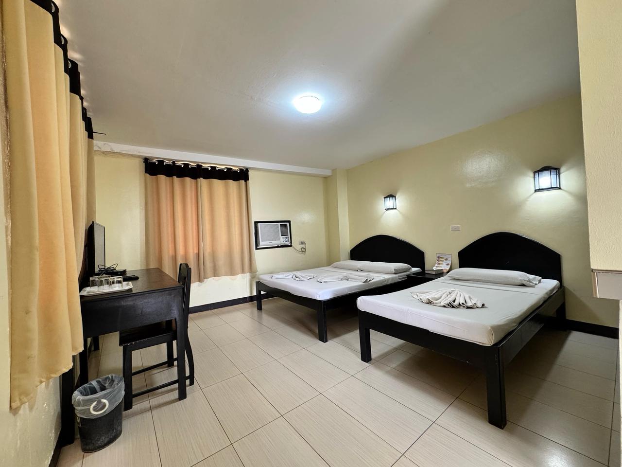 Sampaguita Suites Plaza Garcia家庭标准间