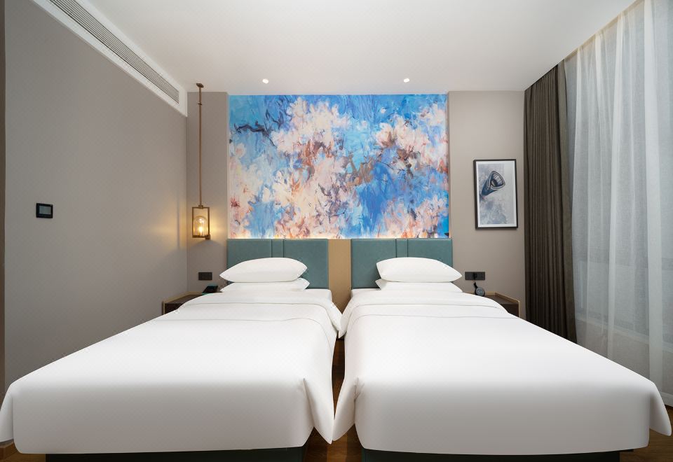 Magnotel Hotel (Jinzhong Lingshi Xinjian Street)Zero Pressure Elegant Twin Room