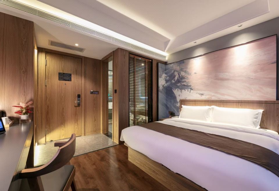 万澳大床房-金可儿床垫.影视会员.