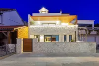 Seafront villa Kupinica with private indoor Pool  호텔