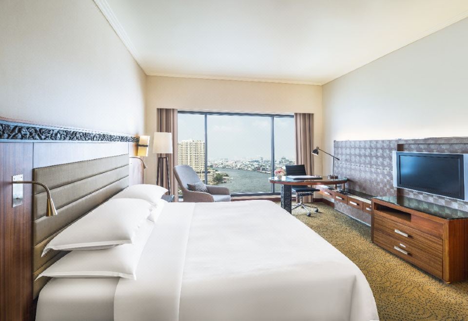 Royal Orchid Sheraton Hotel & TowersDeluxe King Room With River View