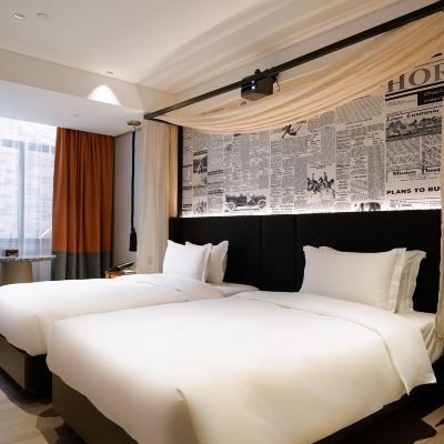 騎士影院豪華雙床房（休閒辦公·迷你冰箱·裸眠床品） 柏高飯店（廣州塔大塘地鐵站店）優惠