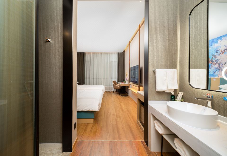 Magnotel Hotel (Jinzhong Lingshi Xinjian Street)Zero Pressure Elegant Twin Room