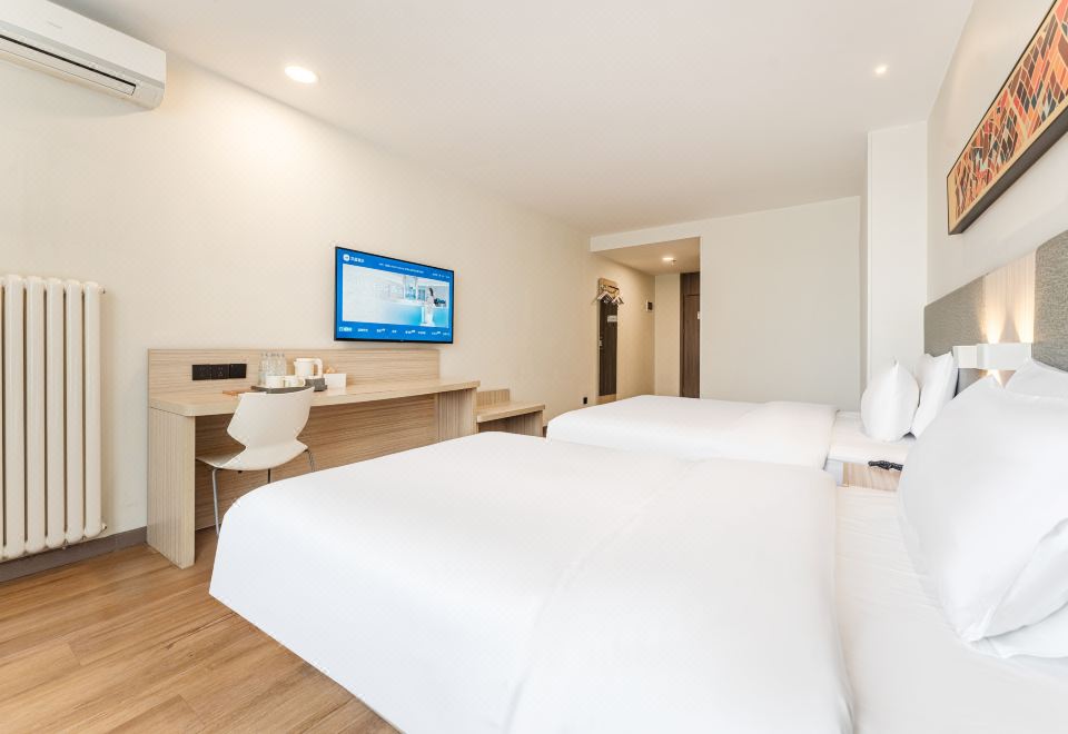 高级双床房【电视投影+舒适空调】