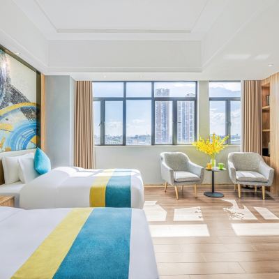 江景雙床房（日落晚霞景+休閒沙發） 可住愛住飯店（佛山容桂漁人碼頭店）優惠