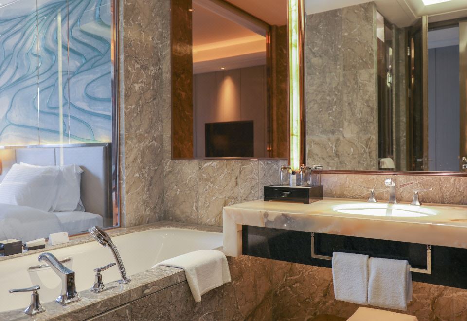 Wanda Vista NanningDeluxe Twin Hollywood Bed