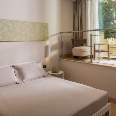 Double Room With Garden View Hotel CalaCuncheddi Promo Code