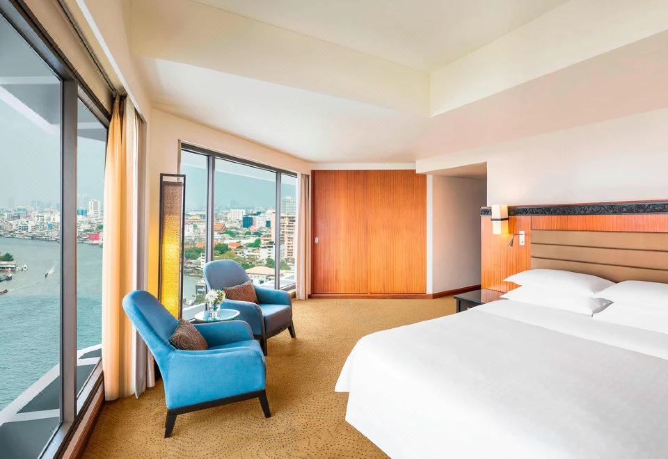 Royal Orchid Sheraton Hotel & TowersExecutive Suite with riverview