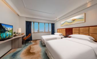 This modern-style bedroom features double beds and large windows that overlook the pool area at Golden Eagle Hotel (Yuexiu Park Xiaobei Subway Station)