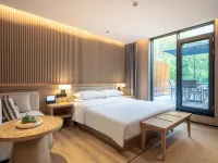 Rezen Retreat · Four Seasons Manju Hotel (Jiuzhaigou Tourist Center) Hotel di Jiuzhaigou