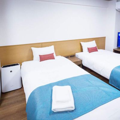 トラベラーズツインルーム かりゆしコンドミニアムリゾート那覇　龍神ホテル浮島 クーポン