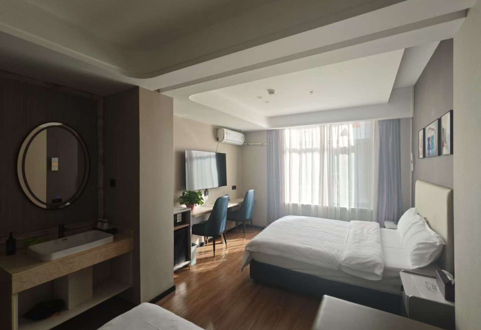 Eaton Shangpin Hotel (Bowen Institute of Technology)Deluxe Room - Courtyard-View (Double Bed) (Air Conditioner, Tv)