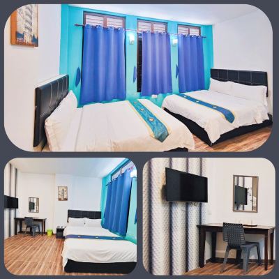 Bilik Deluxe Dua Katil Queen Kupon Inn Residence 18