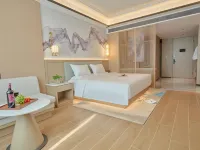 Mingsheng Grand Hotel (tuscaloosa area WuSu railway station nine lotus springs park inn) Ξενοδοχεία στην πόλη Γουούσο