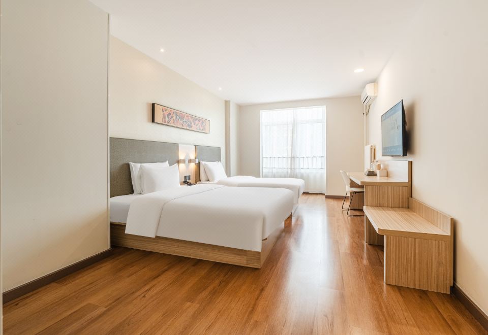 高级双床房【电视投影+舒适空调】