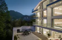JANE Hot Spring Hotel (Anji Yunshang Grassland Panda Tribe Adventure Park Branch) Отели в г. 