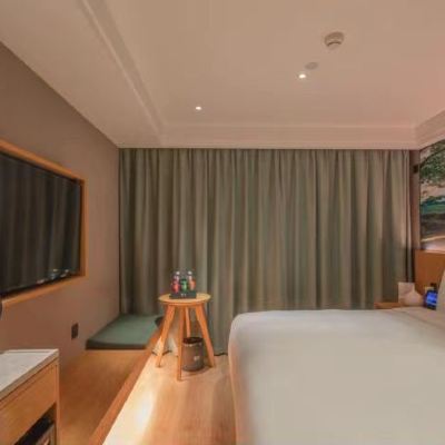 智能按摩大床房（全屋富氧+按摩床墊+獨立空調+冰箱） 秋果飯店（哈爾濱中央大街松花江畔路店）優惠