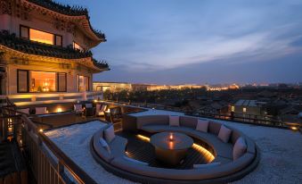 urban hotel, showcasing a captivating view of the illuminated cityscape and a pool located in the foreground at UrCove by HYATT Beijing Forbidden City