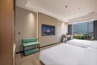 Menghai Boting Hotel (Xishuangbanna Menghai Mengbala International Resort Rainforest Avenue Branch)