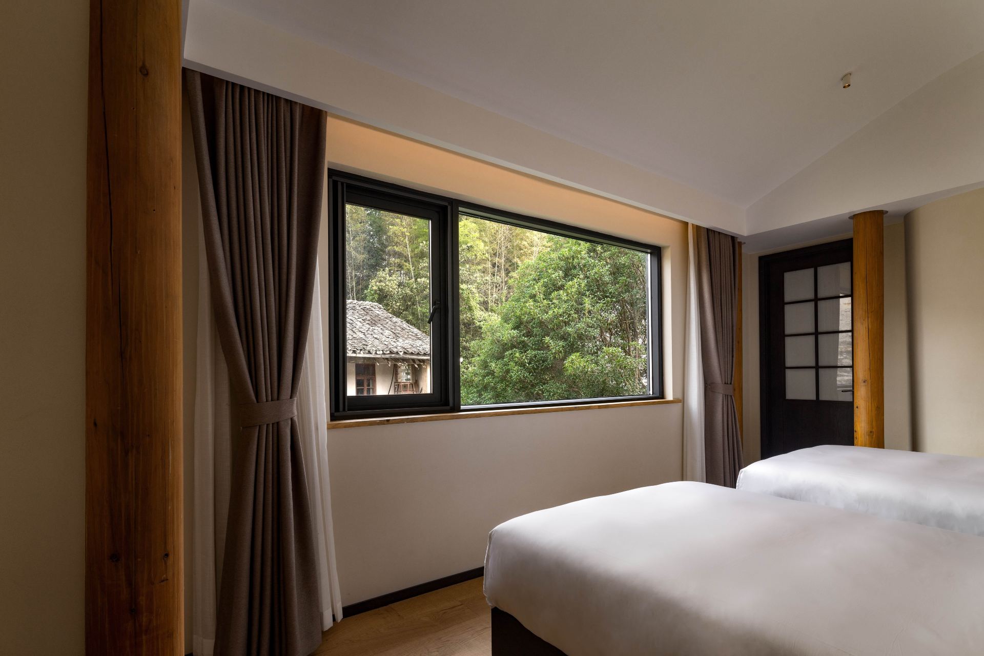 Elegant Courtyard View Twin Beds Room
