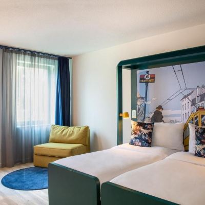 Triple room with 2 single beds and a sofa B&B Hotel Brussels Centre Louise Promo Code