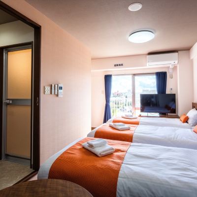 ジョイトリプルルーム かりゆしコンドミニアムリゾート那覇　龍神ホテル浮島 クーポン