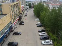 Daqing Huaxi Boutique Hotel فنادق في داتشينغ