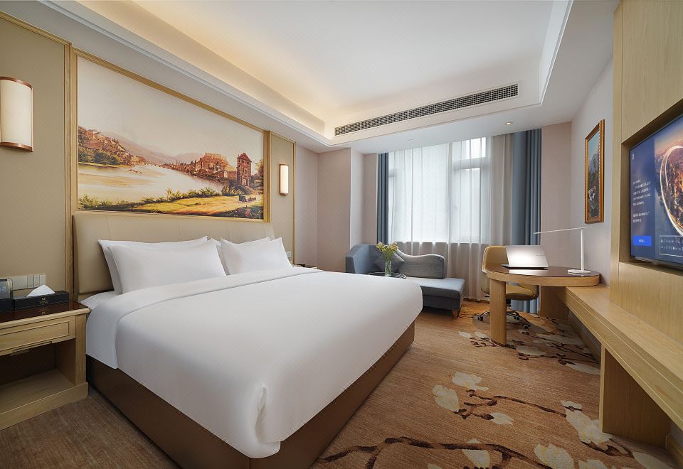 臻礼大床房（休闲沙发+语音助手+小冰箱+双人浴袍）