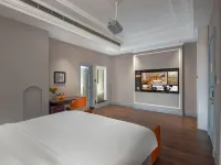 Vienna International Hotel (Jieyang Puning Square Wantaihui Branch)
