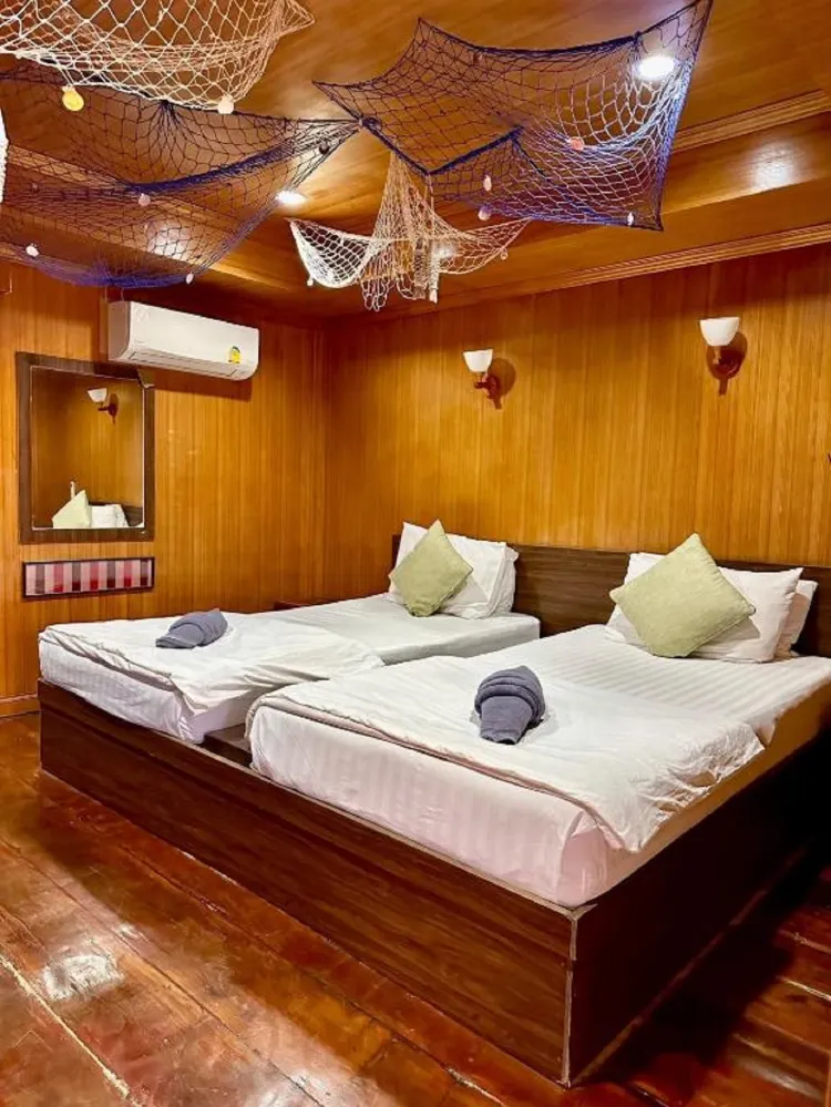 ห้องพักสำหรับสามท่านพร้อมวิวสวน