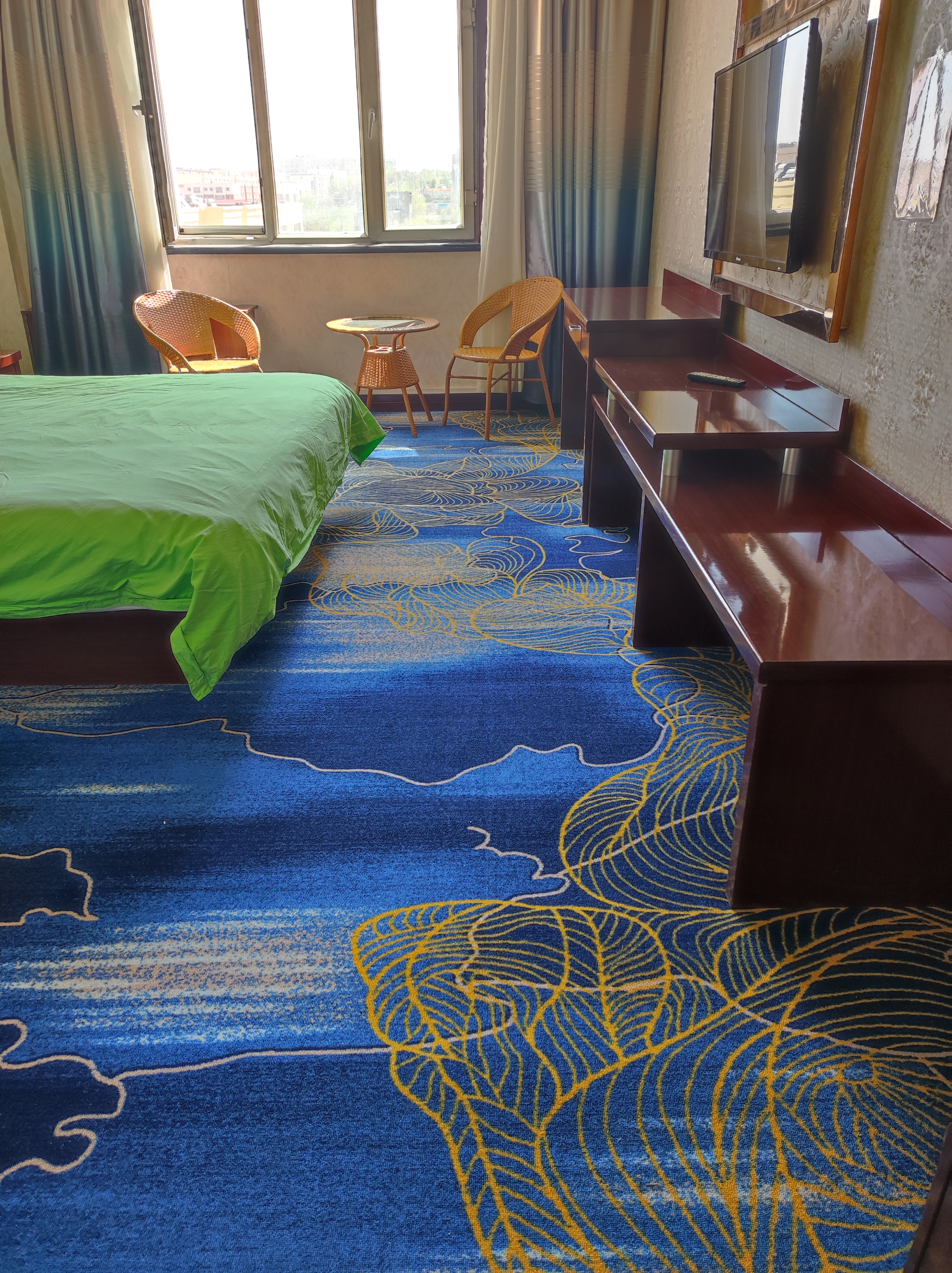 Mulei Sunshine Flower Garden HotelKing-size bed room