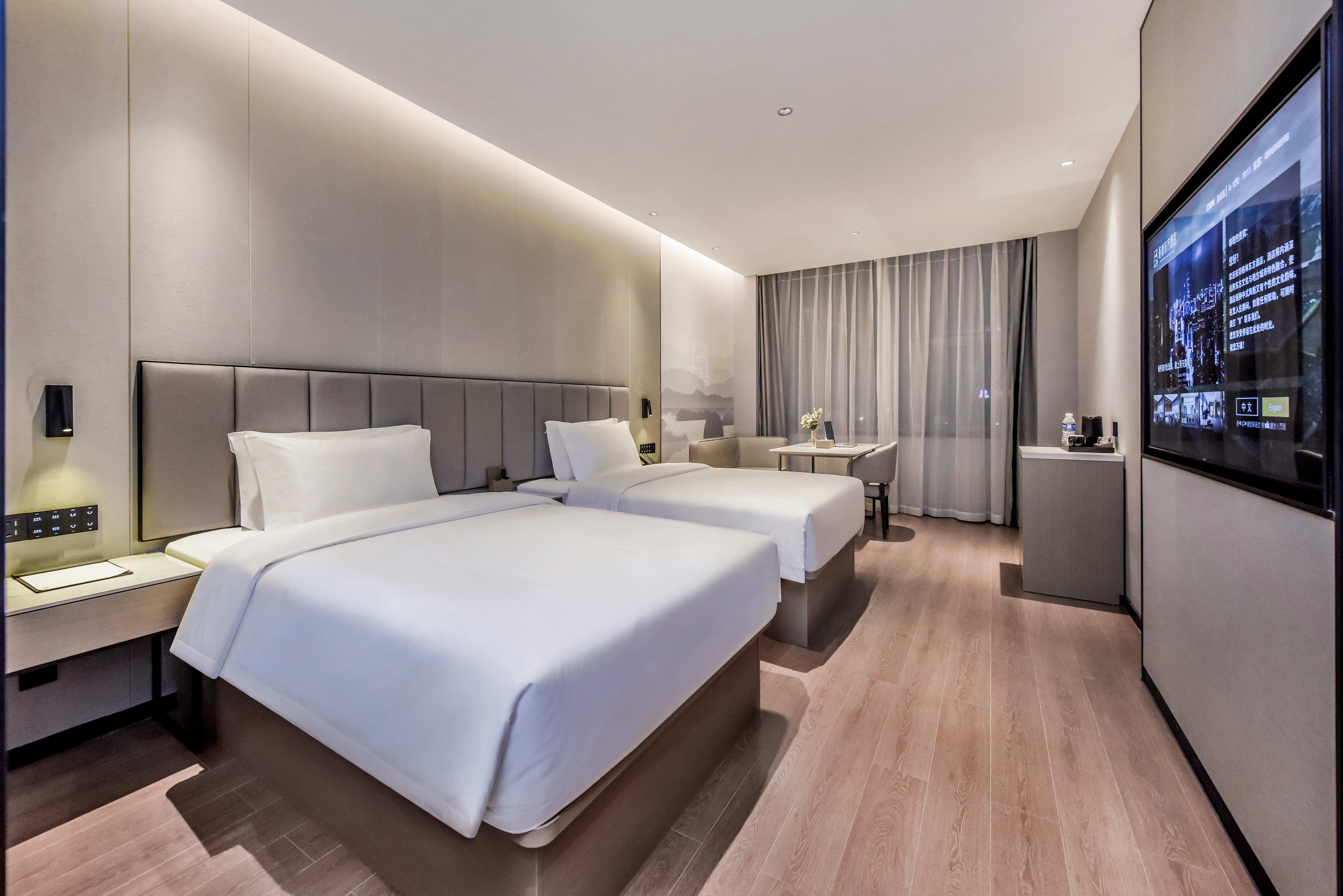 豪华双床房（休闲沙发+双层隔音玻璃）