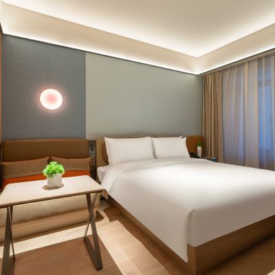 行政套房[休閒客廳+超大浴缸+電視投屏+迷你冰箱] 桔子飯店（成都天府國際機場店）優惠