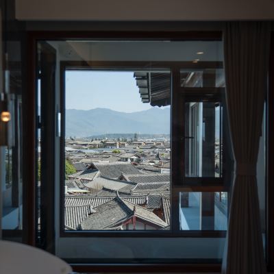 180度觀景大床房:私湯+中央空調+慕思+戴森+科勒+智控 麗江古城淳時·執一觀古城全景民宿優惠