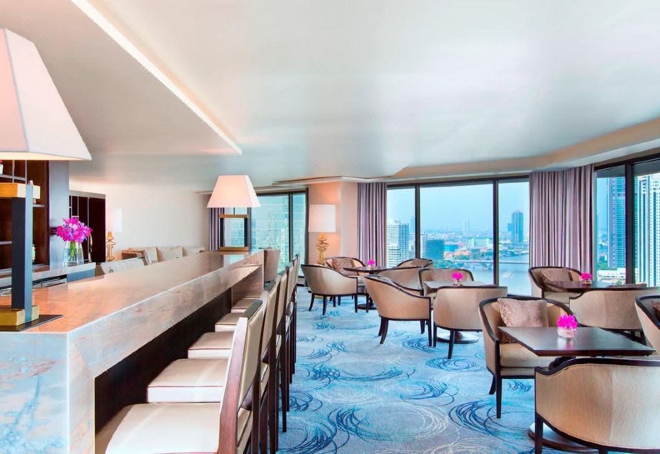 Royal Orchid Sheraton Hotel & TowersClub Deluxe King Room With River View