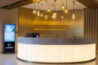 Daqing Guai Boutique Hotel (Daqing West Railway Station Jingyuan Park)