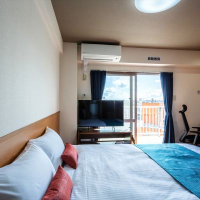 トラベラーズダブル かりゆしコンドミニアムリゾート那覇　龍神ホテル浮島 クーポン